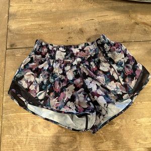 Size 4 regular ladies Lululemon running shorts, multicolored floral print
